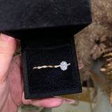 TWIST OVAL CUT MOISSANITE RING